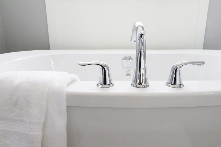 White bath with silver taps