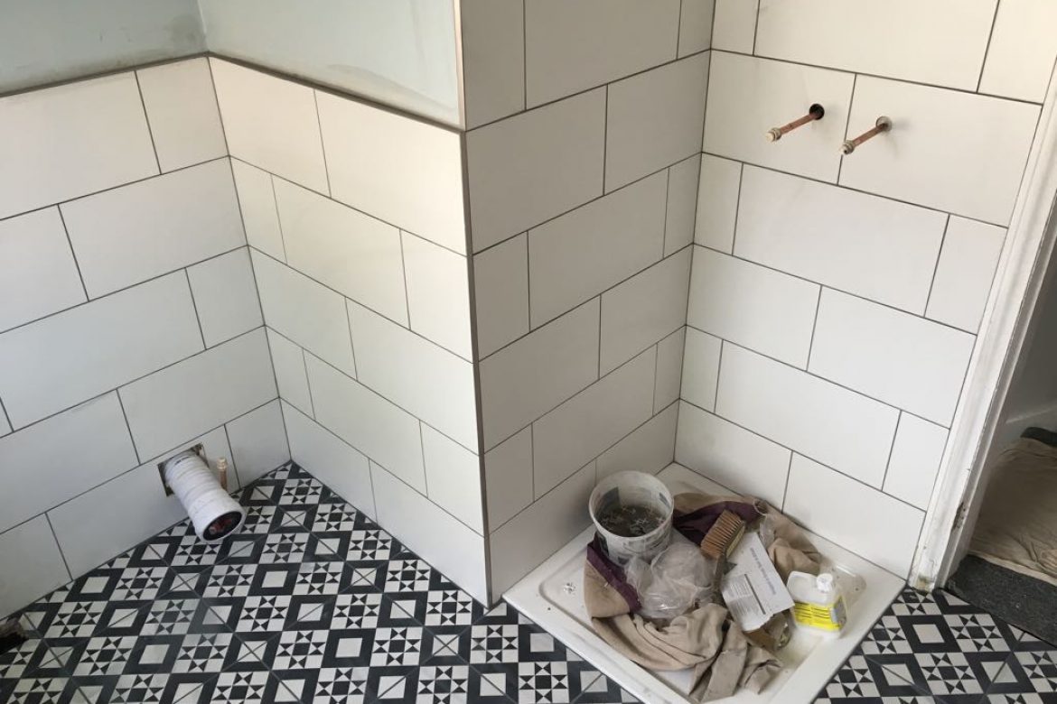 unfinished bathroom with shower tray