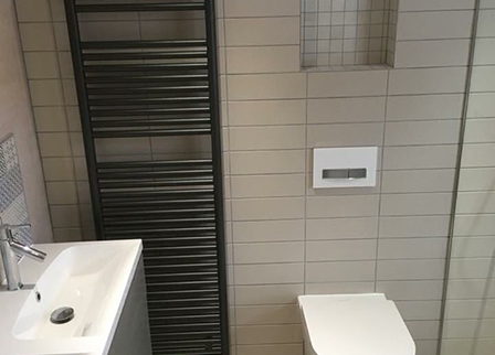 Stylish bathroom with towel radiator